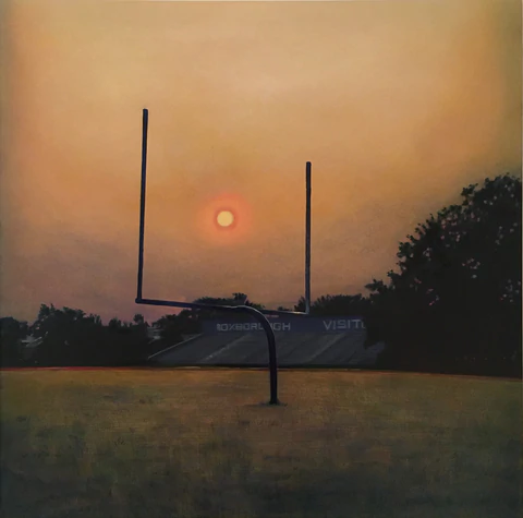 A painting of a football field at sunset, with the setting sun framed by the goal post. There is a set of bleachers in the distance. The sky is orange and the grass is a mix of green and amber.